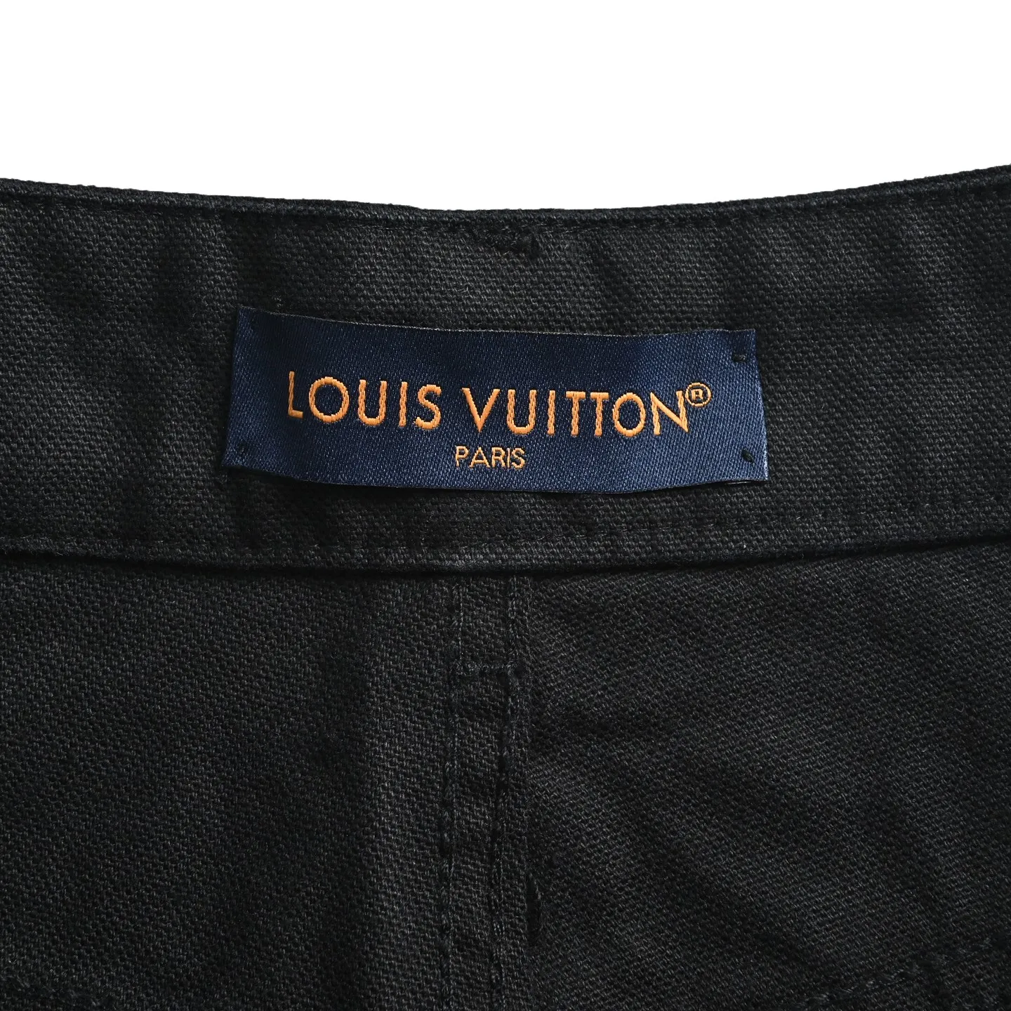 Louis Vuitton studded solid color straight leg trousers